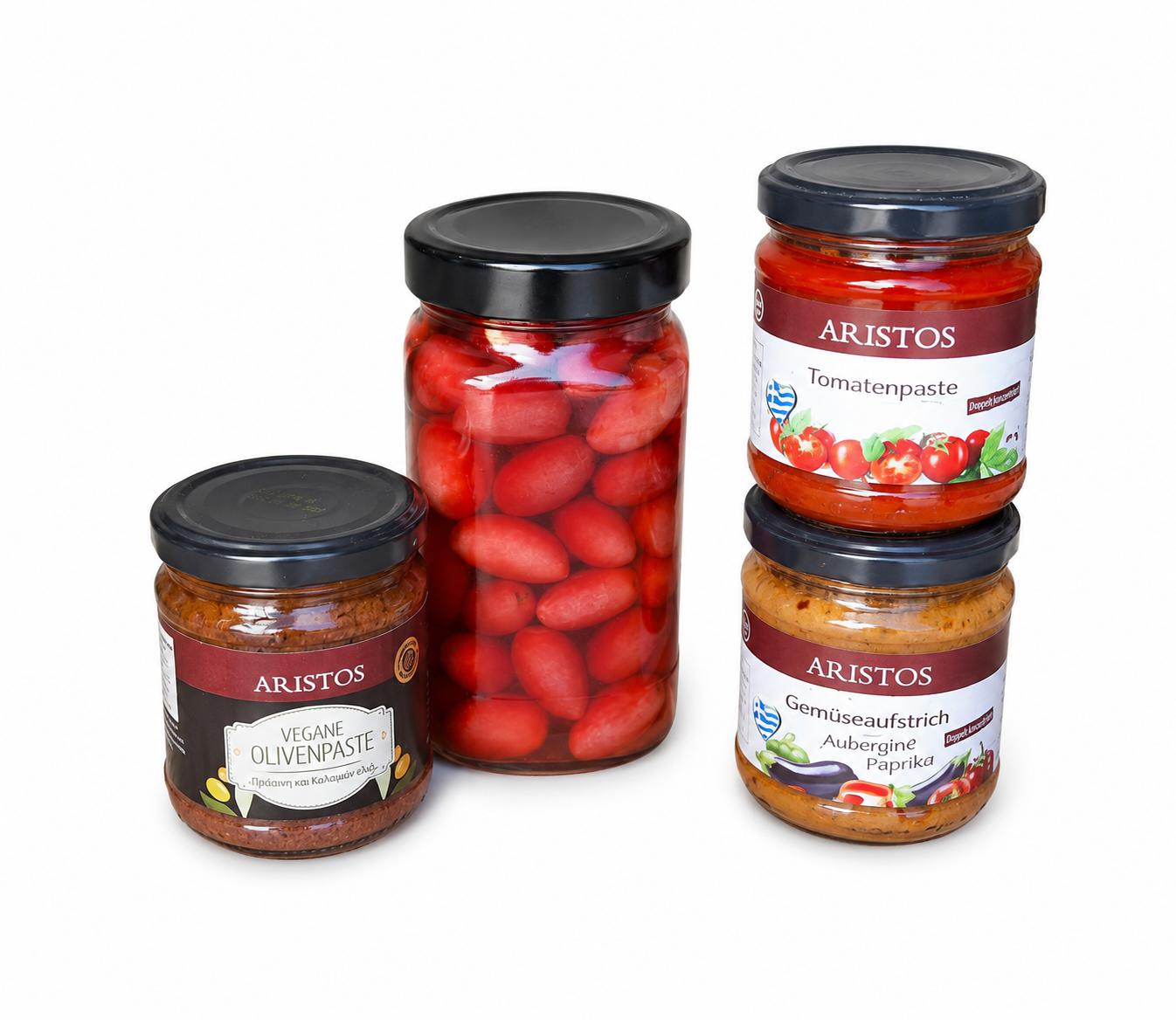 ARISTOS Vegane Olivenpaste, Tomatenpaste und Gemüseaufstrich Aubergine-Paprika neben einem Glas eingelegter Paprika